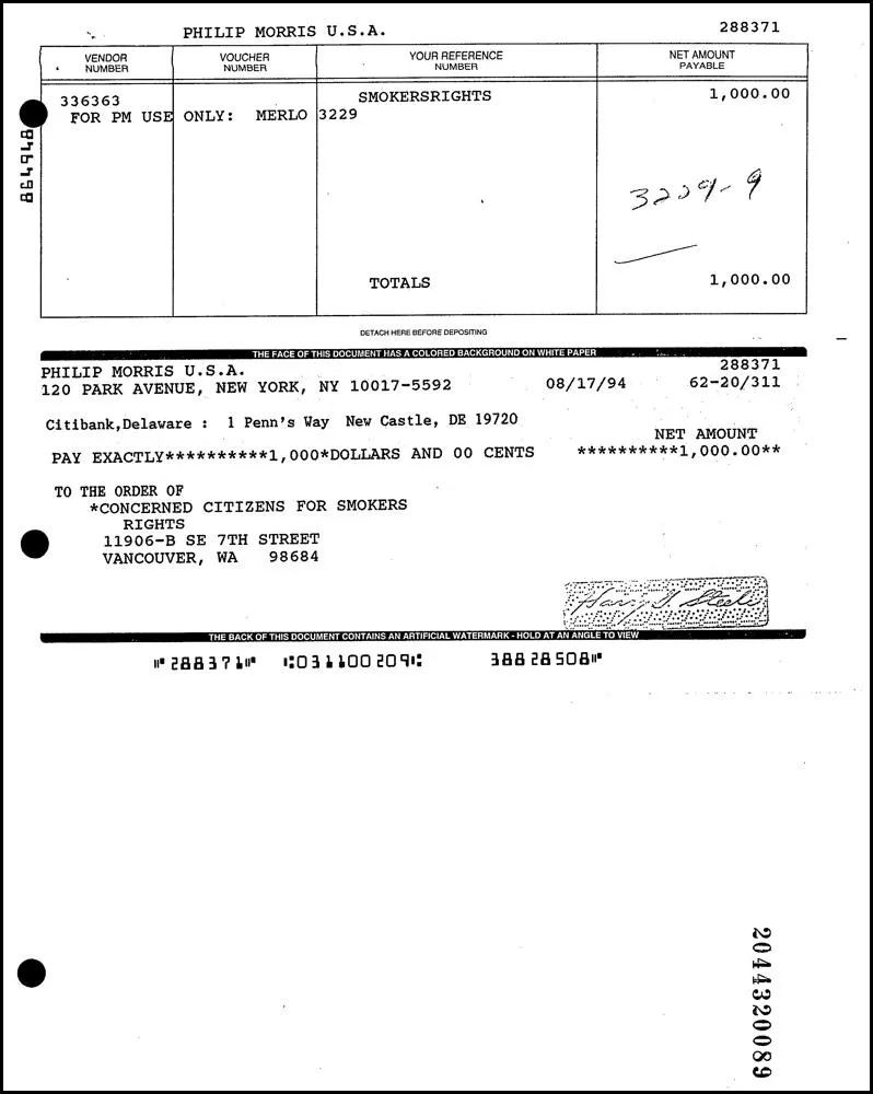 Scanned 1994 Philip Morris check with a payment voucher table, the test document given to Mistral OCR